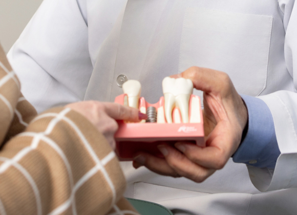 dental implant costs and factors