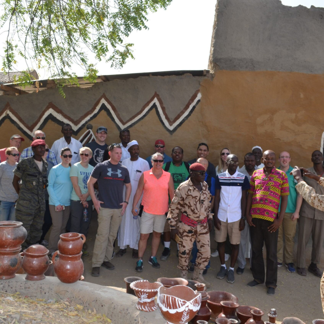 Dr. Ryhn and a group of humanitarians in Chad, Africa.