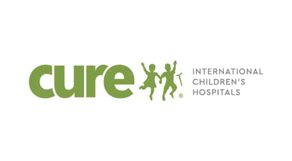 Logo of "Cure International Children's Hospitals" features green text and silhouettes of children holding crutches, symbolizing healthcare and support for children.