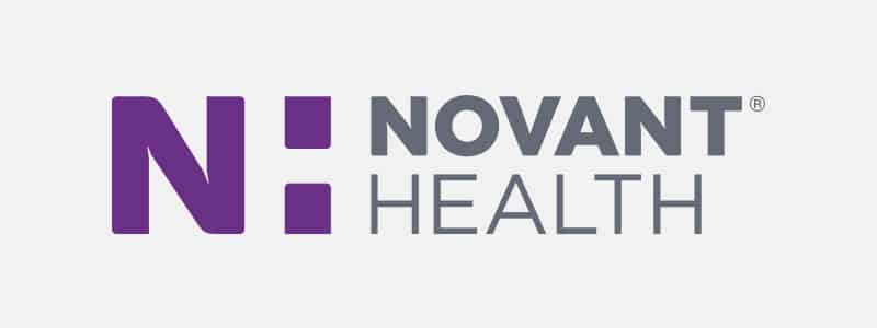 Logo of Novant Health featuring a purple "N" and grey text on a white background, representing a healthcare organization.
